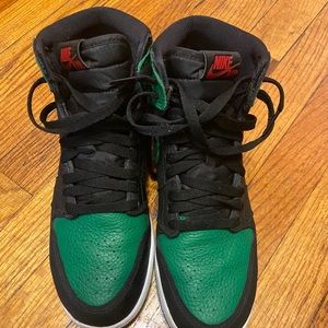 Pine green and black. Red lacing and box included